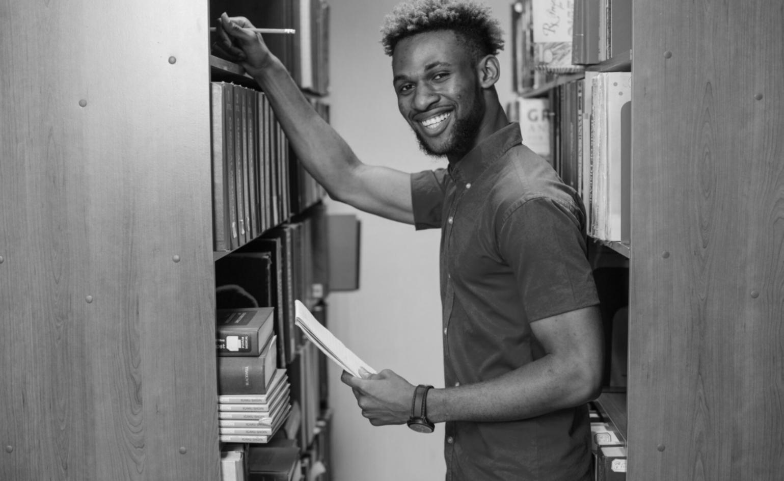 Investment education session with financial charts and learning materials